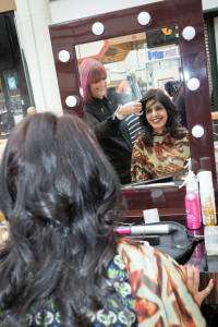 Shaida Saleem gets a hair make-over from Sarah Goacher at the Airedale Centre Good Friday event