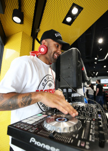 DJ Lamour spins some tunes for shoppers at the opening of the JD sportswear store